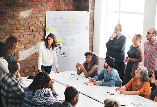 IT team meeting around a big table